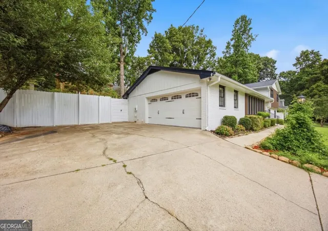Photo 2 of Single family home for sale at 2220 Spring Mill Cvs, Dunwoody, GA 30338 | MLS# 10829759 | Listing updated on 2026-09-03