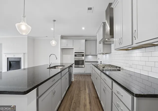 Photo 3 of Townhouse for sale at 6160 Sweet Bay Ln, Alpharetta, GA 30004 | MLS# 10820378 | Listing updated on 2026-09-12