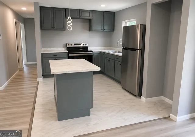 Photo 2 of Single family home for sale at 2830 Allegro Dr Nw, Atlanta, GA 30318 | MLS# 10807759 | Listing updated on 2026-09-01