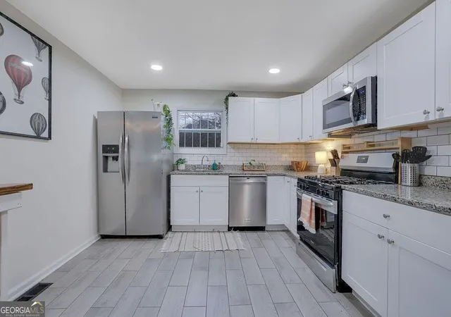 Photo 3 of Single family home for sale at 647 Alfred Rd NW, Atlanta, GA 30331 | MLS# 10801313 | Listing updated on 2026-07-28