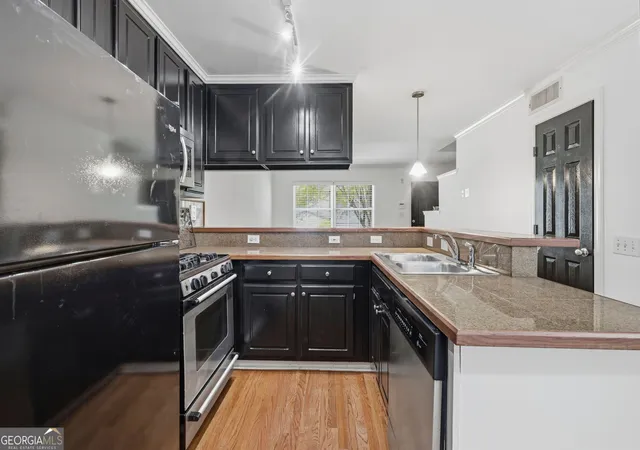 Photo 4 of Townhouse for sale at 2232 Dunseath Ave NW #105, Atlanta, GA 30318 | MLS# 10821849 | Listing updated on 2026-08-21