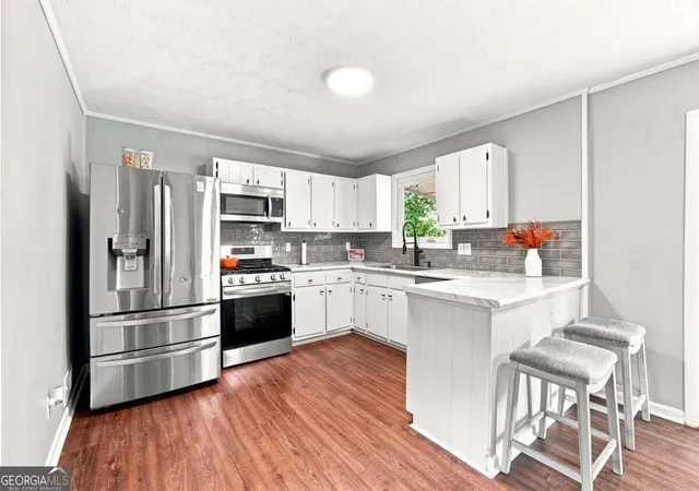 Photo 3 of Single family home for sale at 624 Village Lane Dr Sw, Marietta, GA 30060 | MLS# 10829815 | Listing updated on 2026-09-09