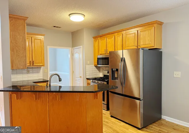 Photo 4 of Single family home for sale at 522 Morgan Ct, Hampton, GA 30228 | MLS# 10810095 | Listing updated on 2026-09-11