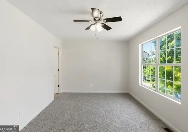 Photo 3 of Townhouse for sale at 1318 Revelstoke Cvs, Riverdale, GA 30296 | MLS# 10818505 | Listing updated on 2026-09-13