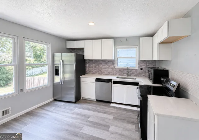 Photo 2 of Single family home for sale at 1088 Nimblewood Way, Stone Mountain, GA 30088 | MLS# 10716826 | Listing updated on 2026-08-01