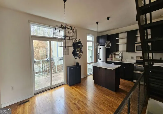 Photo 1 of Townhouse for sale at 1345 Stirling Ct Nw, Atlanta, GA 30318 | MLS# 10795396 | Listing updated on 2026-10-20