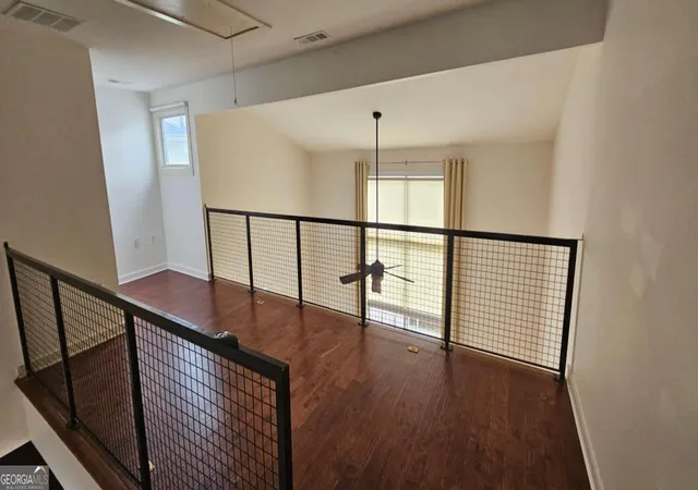 Photo 4 of Townhouse for sale at 1345 Stirling Ct Nw, Atlanta, GA 30318 | MLS# 10795396 | Listing updated on 2026-10-20