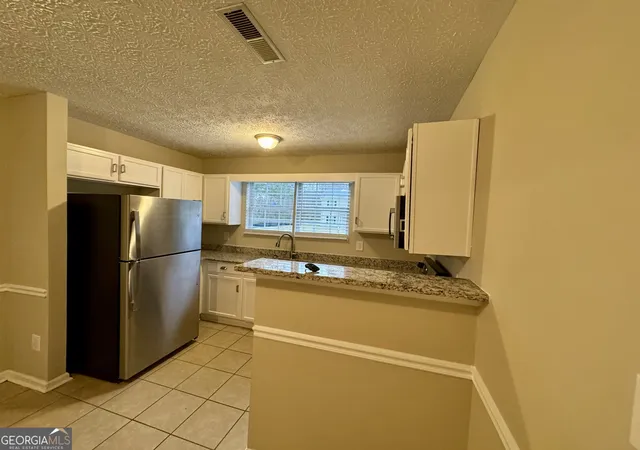 Photo 4 of Sale Pending at 890 Old Rocky Rd, Atlanta, GA 30349 | MLS# 10466287 | Listing updated on 2025-10-02