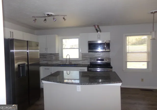 Photo 3 of Single family home for sale at 1700 Pine Cir, Lawrenceville, GA 30044 | MLS# 10691166 | Listing updated on 2026-09-03