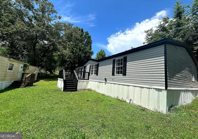 Photo 2 of Manufactured home for sale at 225 Stratford Dr, Hampton, GA 30228 | MLS# 10835770 | Listing updated on 2026-09-12