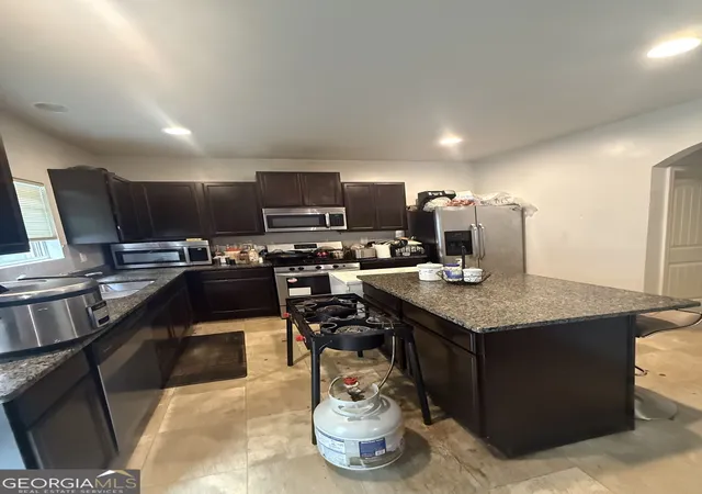 Photo 3 of Single family home for sale at 6572 Woodwell Dr, Union City, GA 30291 | MLS# 10821953 | Listing updated on 2026-09-28
