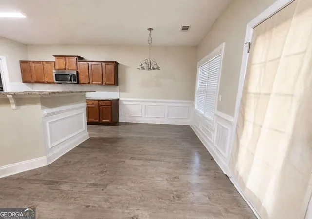 Photo 4 of Single family home for sale at 5871 Apple Grv Rd, Buford, GA 30519 | MLS# 10827816 | Listing updated on 2026-09-21