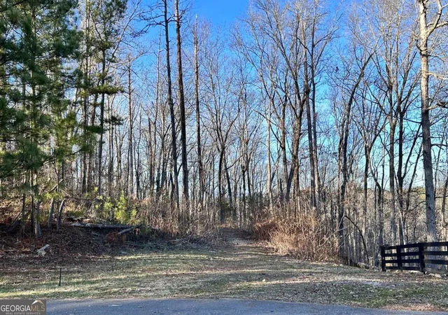 Photo 1 of Land for sale at 8555 Woodland Brooke Trl, Cumming, GA 30028 | MLS# 10730072 | Listing updated on 2026-06-22