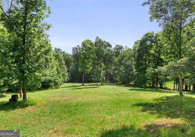 Photo 3 of Sale Pending at 3030 Demooney Rd, Atlanta, GA 30349 | MLS# 10256622 | Listing updated on 2026-02-05
