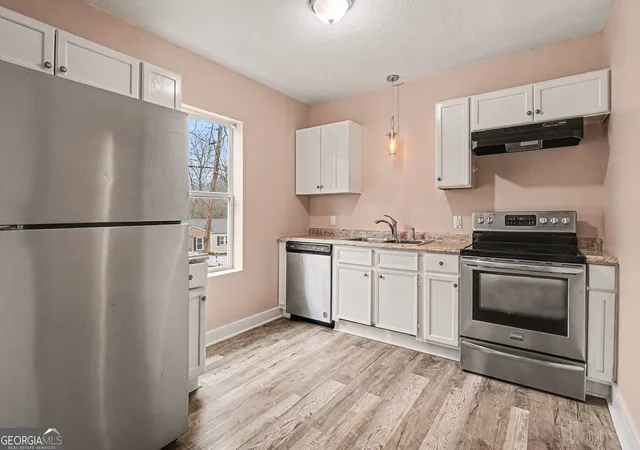 Photo 3 of Sale Pending at 2047 Baker Rd, Atlanta, GA 30318 | MLS# 10764434 | Listing updated on 2026-05-26
