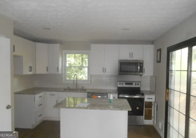 Photo 2 of Single family home for sale at 4485 Spring Valley Pkwy, South Fulton, GA 30349 | MLS# 10787347 | Listing updated on 2026-09-24