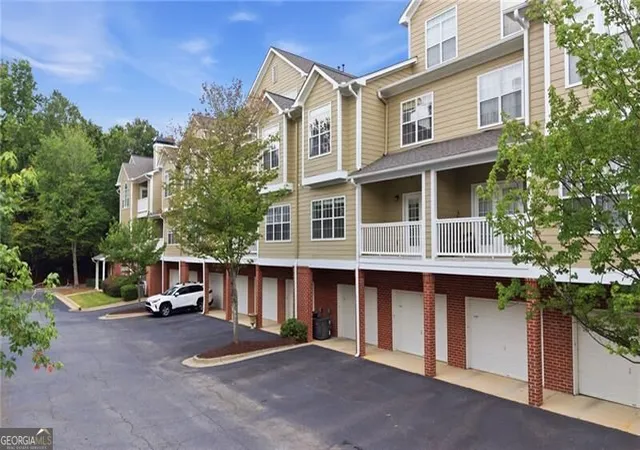 Photo 1 of Townhouse for sale at 5110 Woodland Ln, Alpharetta, GA 30009 | MLS# 10823030 | Listing updated on 2026-09-16