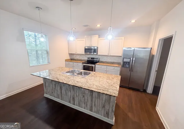 Photo 2 of Single family home for sale at 611 Dodson Lake Ct, Fairburn, GA 30213 | MLS# 10821892 | Listing updated on 2026-09-11