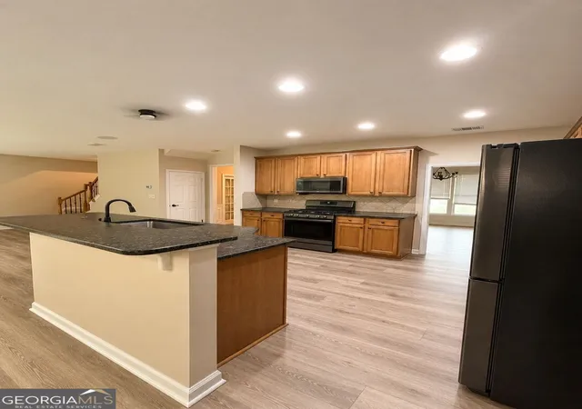 Photo 3 of Single family home for sale at 945 Grand Ivey Pl, Dacula, GA 30019 | MLS# 10823908 | Listing updated on 2026-09-28