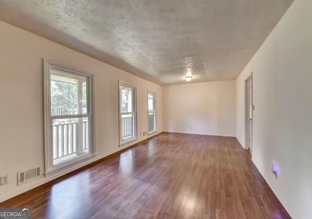 Photo 4 of Single family home for sale at 1138 Woodland Cir, Lawrenceville, GA 30043 | MLS# 10825288 | Listing updated on 2026-09-21