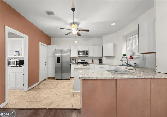 Photo 4 of Single family home for sale at 7248 Wheeler Trl, Lithonia, GA 30058 | MLS# 10811983 | Listing updated on 2026-09-23