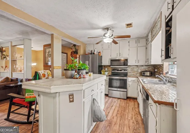 Photo 3 of Single family home for sale at 5228 Tina Ct, Stone Mountain, GA 30083 | MLS# 10836573 | Listing updated on 2026-09-17