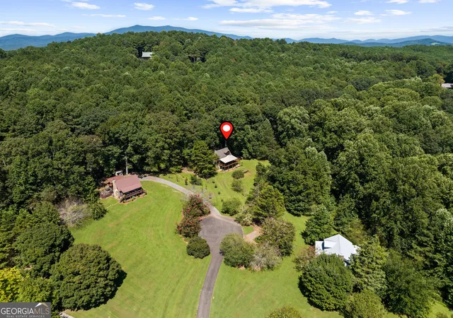 Photo 2 of Single family home for sale at 104 Blue Mountain Ln, Ellijay, GA 30536 | MLS# 10836649 | Listing updated on 2026-09-14