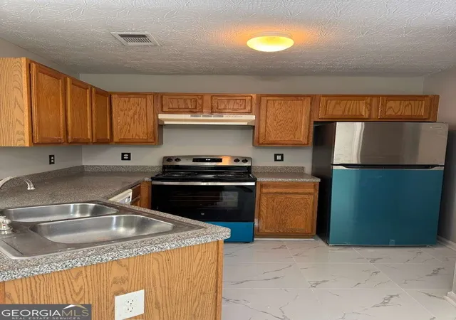 Photo 3 of Townhouse for sale at 1513 Eastern Sunrise Ln, Decatur, GA 30034 | MLS# 10784539 | Listing updated on 2026-09-10