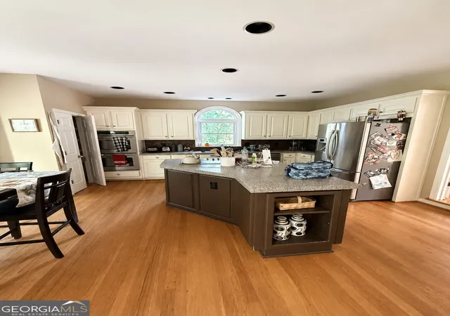 Photo 2 of Single family home for sale at 115 Norwick Way, Johns Creek, GA 30022 | MLS# 10804856 | Listing updated on 2026-08-19