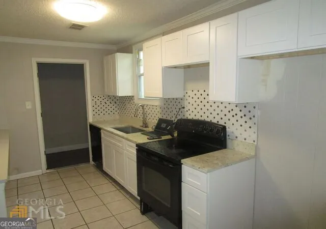 Photo 4 of Single family home for sale at 1035 Putnam St, Macon, GA 31206 | MLS# 10822340 | Listing updated on 2026-08-23