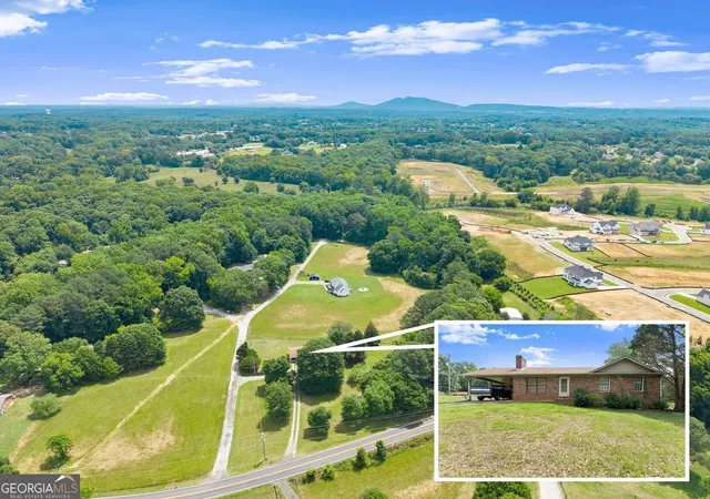 Photo 4 of Single family home for sale at 5590 A Howard Rd, Cumming, GA 30040 | MLS# 10783780 | Listing updated on 2026-08-01