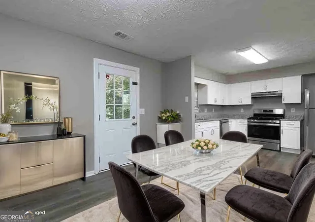 Photo 2 of Townhouse for sale at 4040 Laurie Jo Dr, Marietta, GA 30008 | MLS# 10835827 | Listing updated on 2026-09-12