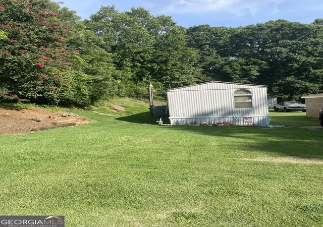 Photo 3 of Manufactured home for sale at 5911 Church St, Flowery Branch, GA 30542 | MLS# 10821989 | Listing updated on 2026-09-14