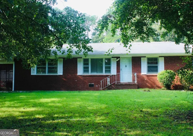 Photo 1 of Land for sale at 4460 Stonewall Tell Rd, Atlanta, GA 30349 | MLS# 10593891 | Listing updated on 2026-01-29