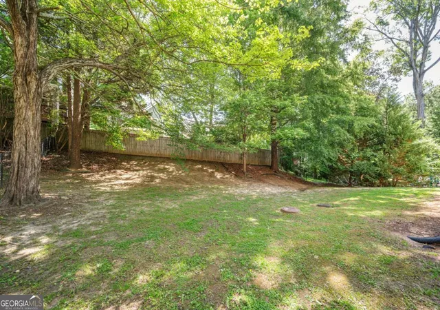 Photo 3 of Single family home for sale at 2199 Collins Dr NW, Atlanta, GA 30318 | MLS# 10768340 | Listing updated on 2026-09-15
