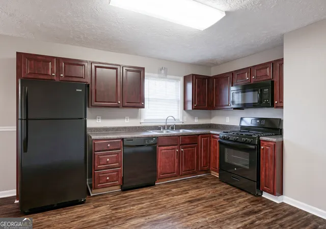 Photo 4 of Single family home for sale at 1481 Smokehouse Ln, Stone Mountain, GA 30088 | MLS# 10765854 | Listing updated on 2026-09-18