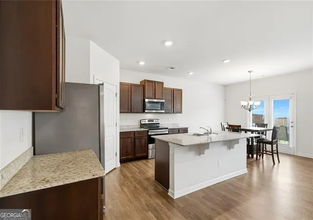 Photo 4 of Single family home for sale at 5396 Pennington Ct, Atlanta, GA 30349 | MLS# 10800681 | Listing updated on 2026-09-23