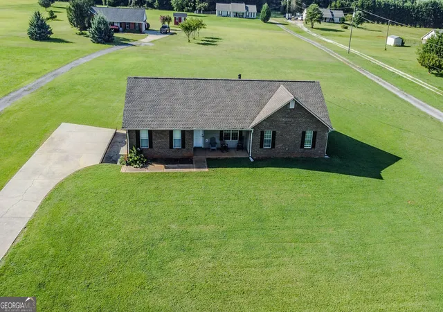 Photo 3 of Single family home for sale at 309 Snapping Shls Rd, Mcdonough, GA 30252 | MLS# 10812906 | Listing updated on 2026-09-11