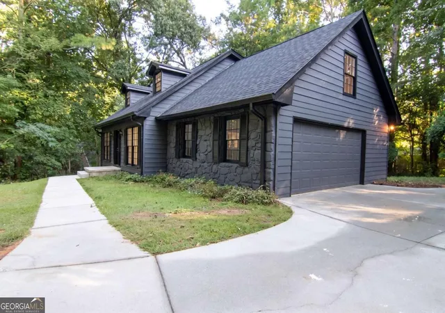 Photo 3 of Single family home for sale at 4877 Alpine Dr Sw, Lilburn, GA 30047 | MLS# 10823739 | Listing updated on 2026-08-28