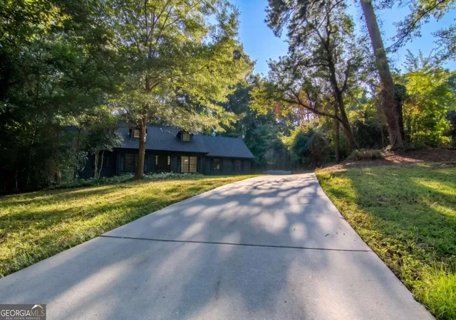 Photo 3 of Single family home for sale at 4877 Alpine Dr Sw, Lilburn, GA 30047 | MLS# 10823739 | Listing updated on 2026-08-28