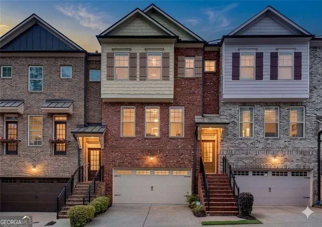 Photo 1 of Townhouse for sale at 9005 Woodland Trl, Alpharetta, GA 30009 | MLS# 10817181 | Listing updated on 2026-09-11