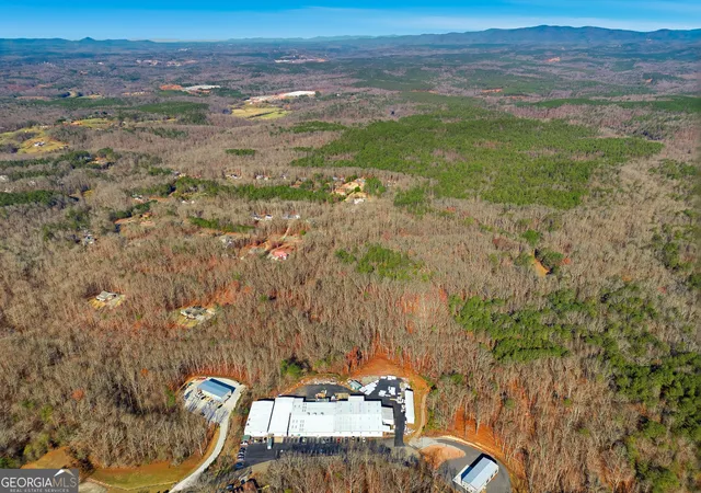Photo 2 of Land for sale at 209 Hogan Pond Ln, Ball Ground, GA 30107 | MLS# 10658416 | Listing updated on 2026-08-26