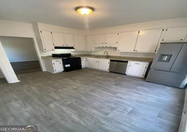 Photo 3 of Multi family home for sale at 1434 Spring Ml Cvs Ne #A & B, Conyers, GA 30012 | MLS# 10792648 | Listing updated on 2026-07-03