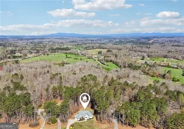 Photo 3 of Single family home for sale at 7055 Bannister Rd, Cumming, GA 30028 | MLS# 10836627 | Listing updated on 2026-09-14