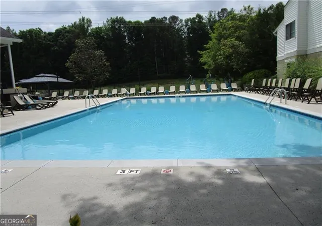 Listing Photo 2 - Condo for sale in building located at 4003 Wingate Wy, Sandy Springs, GA 30350 - Unit #