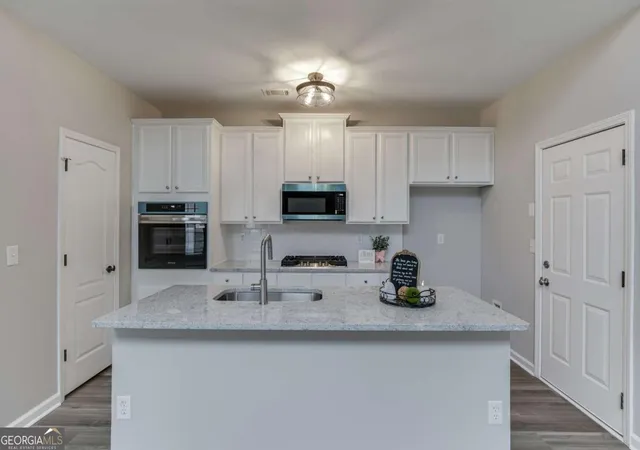 Photo 3 of Single family home for sale at 3941 Lake Pass Ln, Suwanee, GA 30024 | MLS# 10803950 | Listing updated on 2026-09-18