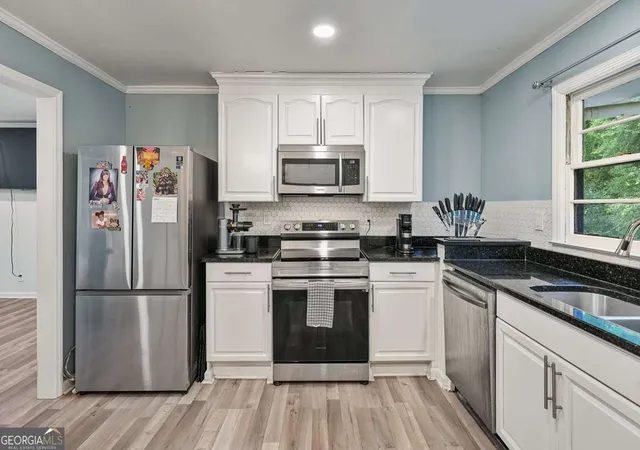 Photo 2 of Single family home for sale at 3599 Saturn Dr NW, Atlanta, GA 30331 | MLS# 10765339 | Listing updated on 2026-09-12