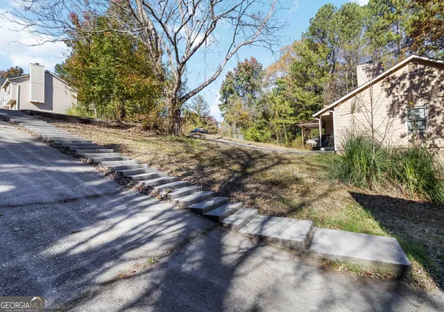 Photo 2 of Single family home for sale at 2725 Wildflower Ln, Snellville, GA 30039 | MLS# 10827354 | Listing updated on 2026-09-28