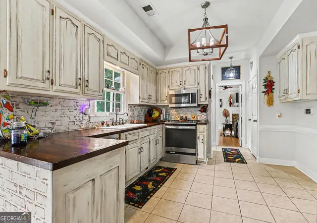 Photo 4 of Single family home for sale at 7025 Oakcreek Tr, Cumming, GA 30041 | MLS# 10779294 | Listing updated on 2026-07-17