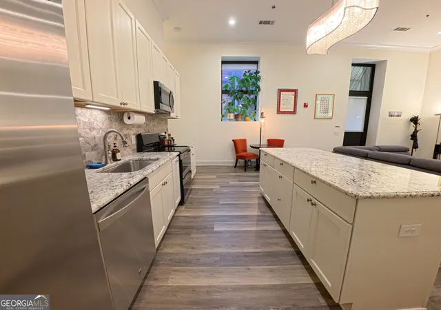 Photo 3 of Single family home for sale at 522 Cherry St #APT 101, Macon, GA 31201 | MLS# 10818694 | Listing updated on 2026-09-11